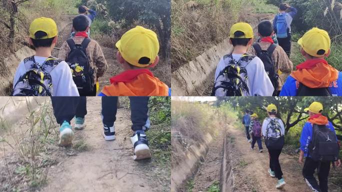 小学生行走山路小学生夏令营走路徒步山野岭