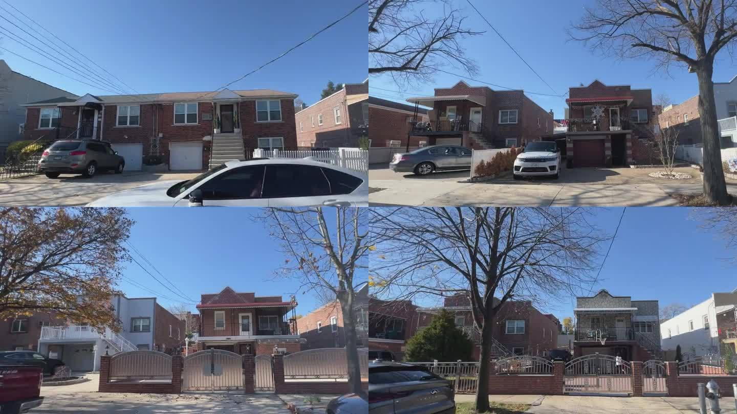 在一个晴朗的日子里，在纽约东布朗克斯，一个充满了单户和多户住宅的社区的侧车镜头