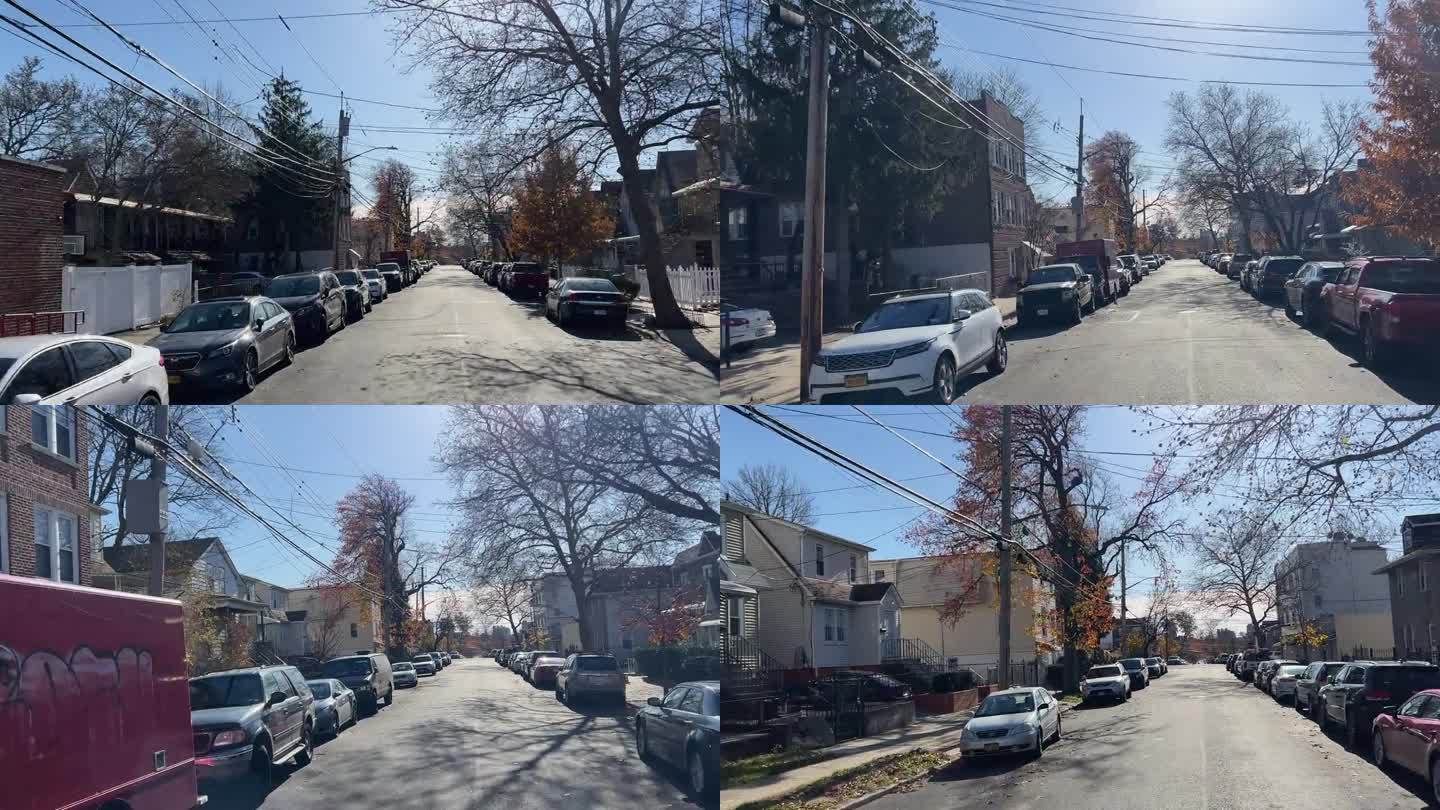 在一个晴朗的日子里，纽约东布朗克斯的单户住宅的汽车视角