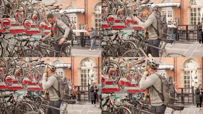 一名男子准备在繁忙的伦敦自行车停车场骑车