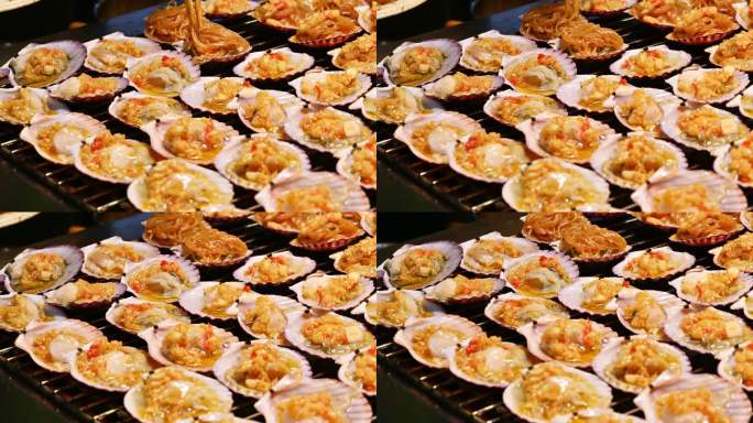 海南三亚夜市街头美食碳烤生蚝扇贝海胆海鲜