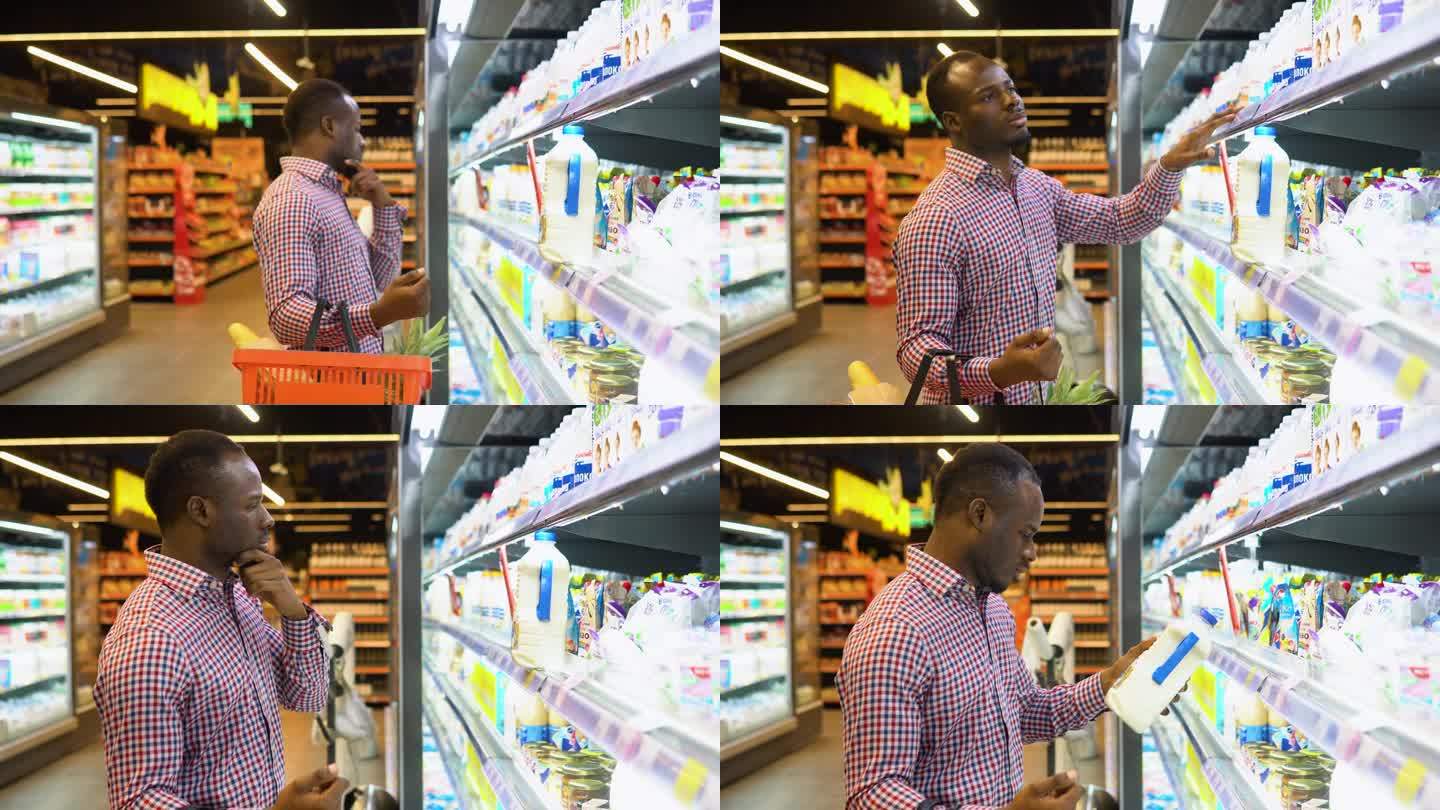 帅气的黑人在杂货店买牛奶