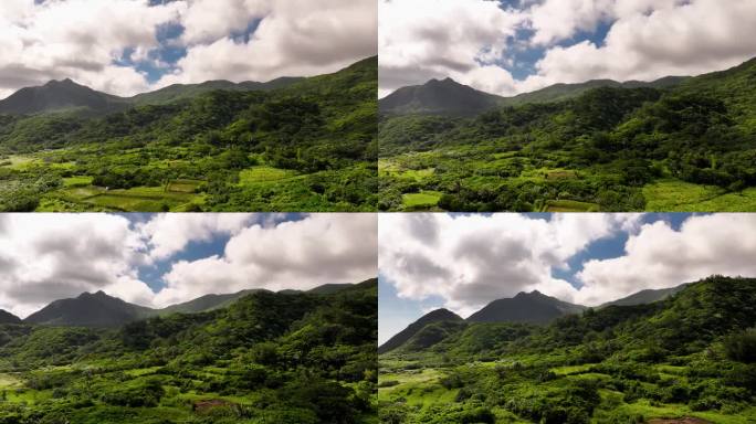 空中飞越田园诗般的异国山景，兰花岛上天空中的云朵在移动蘭嶼 在台湾