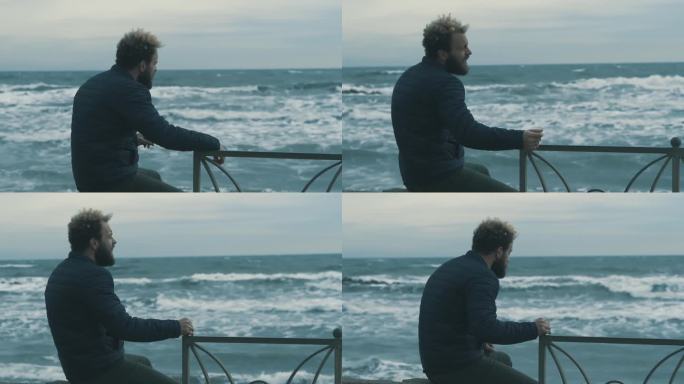 一个寒冷多云的秋日，一个年轻人在海边欢快地哼着小曲，他的精神洋溢着幸福
