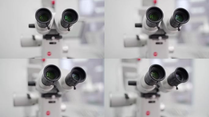 现代医学研究实验室显微镜目镜管近景。为科学家在遗传学实验室、生物技术工作提供了现代化的设备。口腔显微