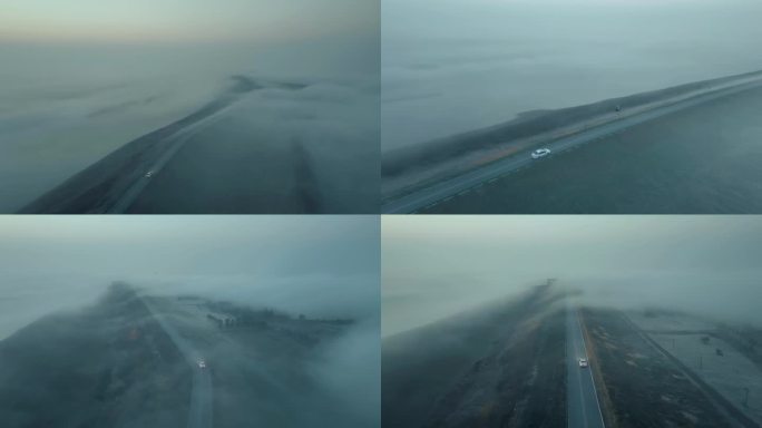 航拍汽车行驶在雾中