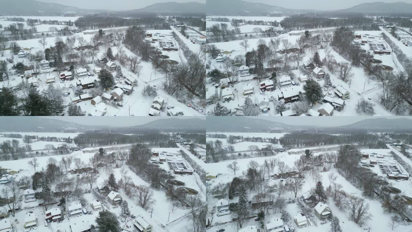全景空中飞行在北安普顿市中心外的古色古香的郊区覆盖在雪