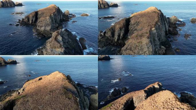 无人机拍摄的小岩石岛屿的视频最后向下平移