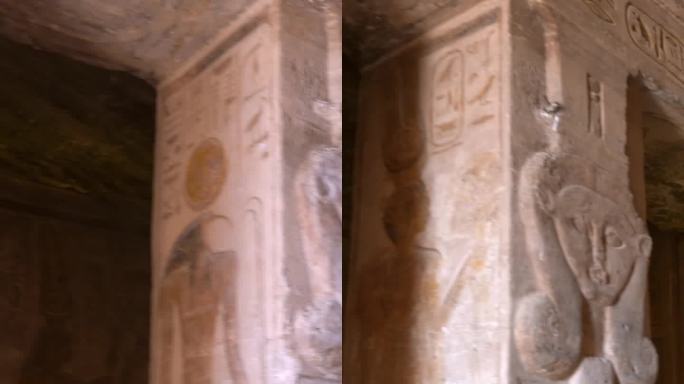 埃及南部努比亚靠近纳赛尔湖的阿布辛贝神庙旁的奈费尔塔里神庙内的圆柱和象形文字绘画。法老神庙拉美西斯二