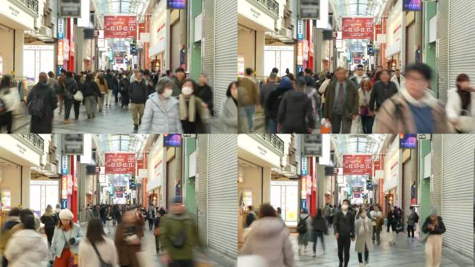 延时摄影:日本大阪新斋桥购物街的行人和游客