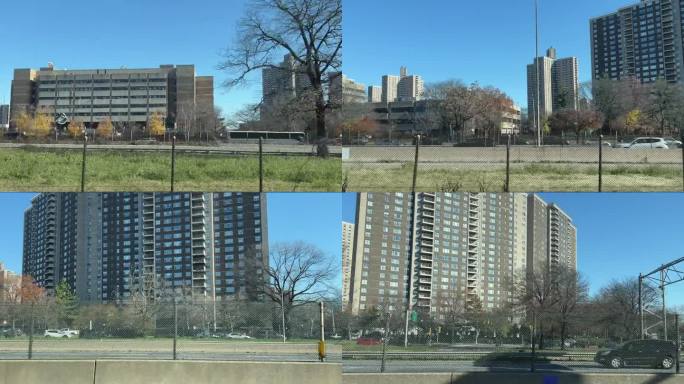从95号州际公路(I-95)向东布朗克斯的大型公寓楼拍摄的侧视图，在一个晴朗的蓝天上