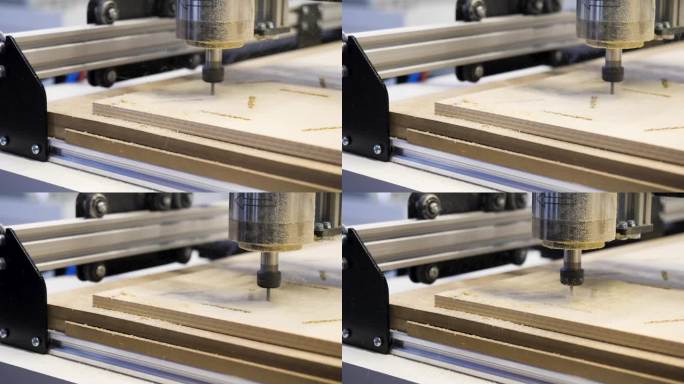 木工机器切割木板的特写。媒体。用自动机器在木头上刻上漂亮的图案。用自动化机器雕刻木雕。
