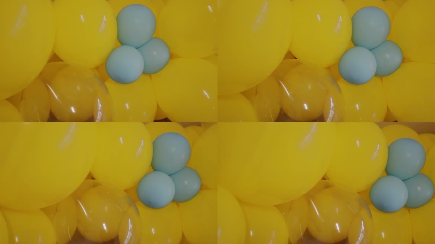一群黄色的气球带着一点蓝色——近距离观察