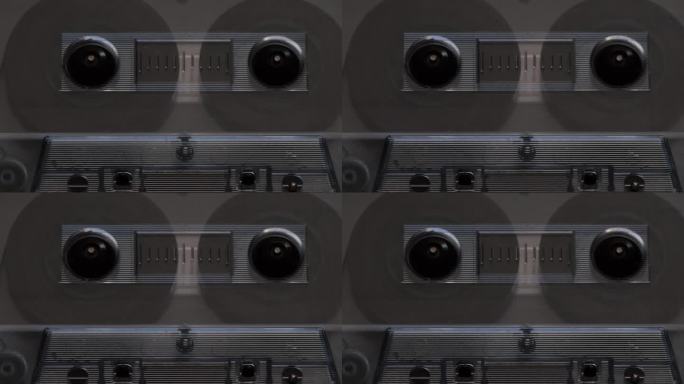 盒式磁带倒带的特写。盒式录音机宏。80年代的音响设备。家庭音频音乐收藏