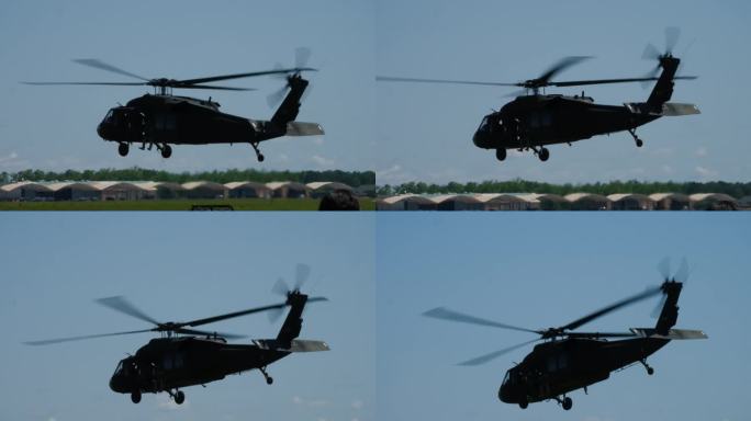 军用直升机载着士兵在高空飞行