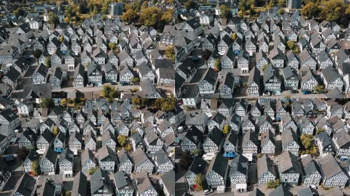 一架无人驾驶飞机飞过德国科德堡相同的房屋