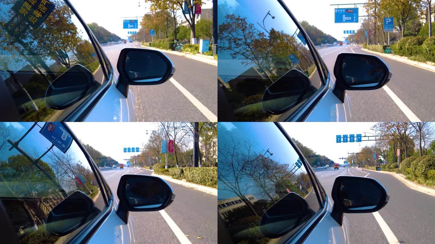 城市马路汽车开车第一视角后视镜风景视频素