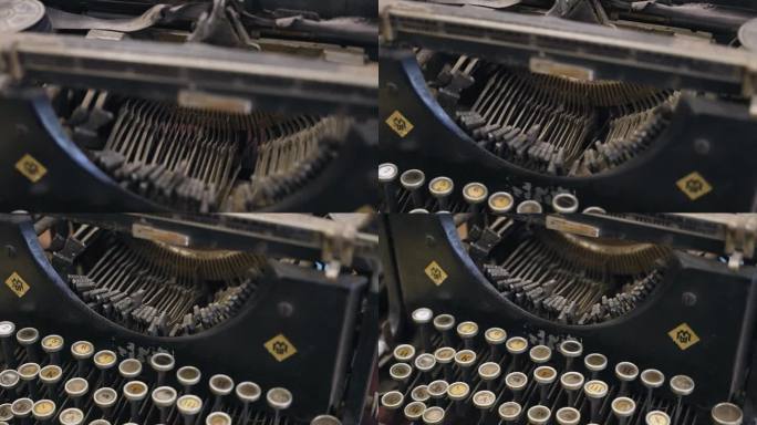 古董打字机的细节和机械装置的特写。一件非常漂亮的古董
