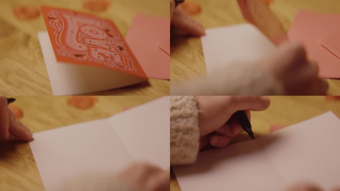 年轻女子写并包装了一张情人节卡片