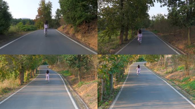 女人在山路上骑自行车