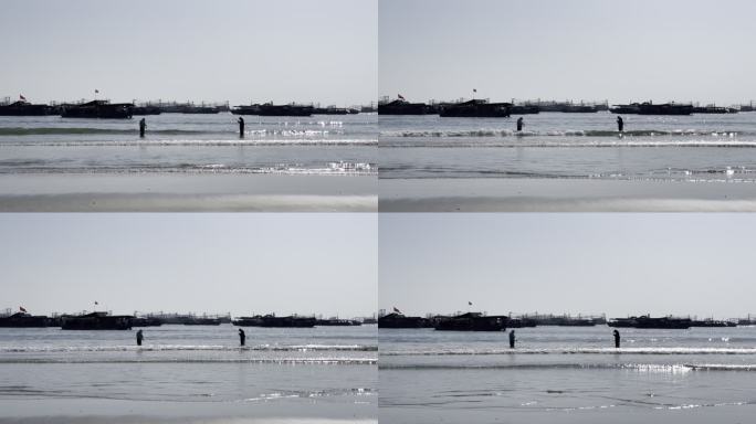 冬天的广西北海侨港海滩码头海浪渔船渔民