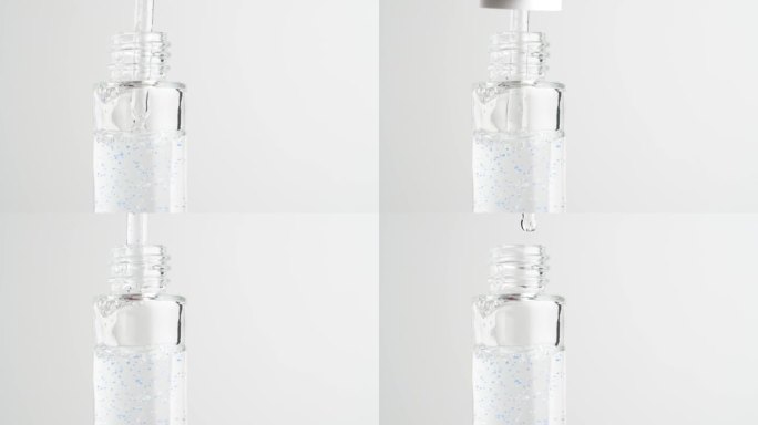 用移液管抽吸并将蓝色颗粒的血清分配到瓶中。化妆品、护肤的概念