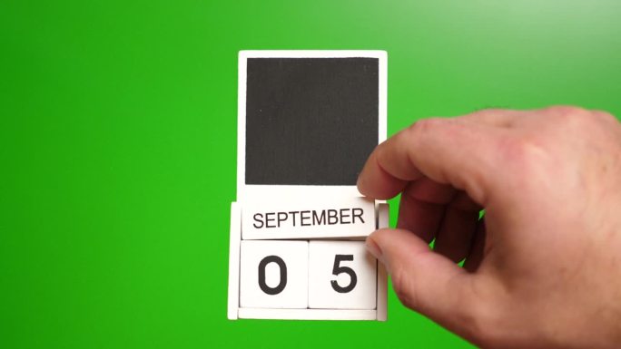 日历日期为9月5日，绿色背景。说明某一特定日期的事件。