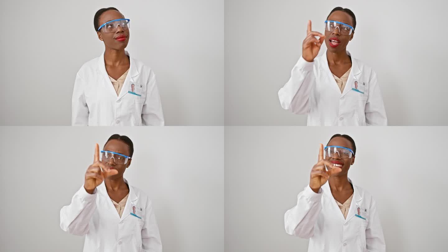 兴奋的非裔美国女科学家，穿着制服，有了个好主意!一只手指向上指，一张欢快的脸照亮了单纯的白色孤立背景