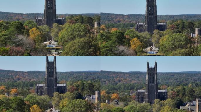 杜克大学教堂。秋季校园绿地上的航拍长镜头，展示了标志性的哥特式石头建筑。