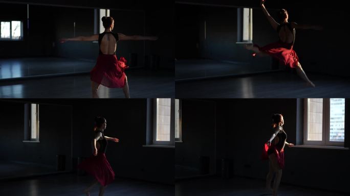 住相机。芭蕾舞女演员在黑暗的舞蹈大厅里连续表演了几个优美的旋转跳跃，然后在窗边停下来休息。