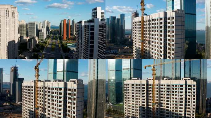 航拍大连东港建筑施工建楼房地产高楼盖楼