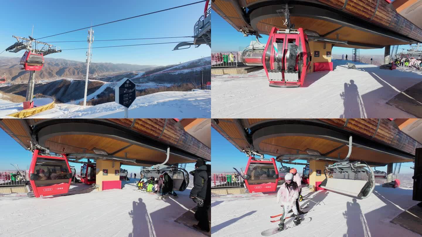 滑雪场缆车运行 下缆车的滑雪者
