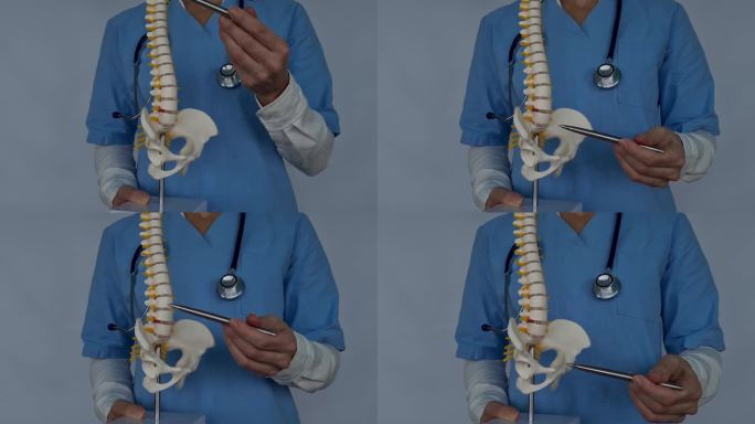 医生显示关节移位的椎间盘疝有炎症和疼痛