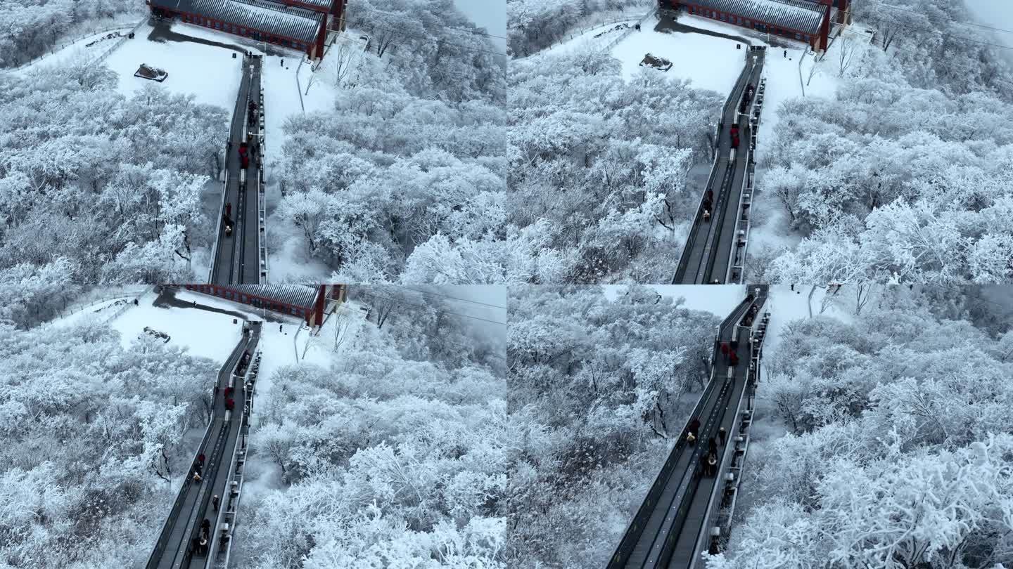 航拍雪中陕西汉中龙头山自动步行梯