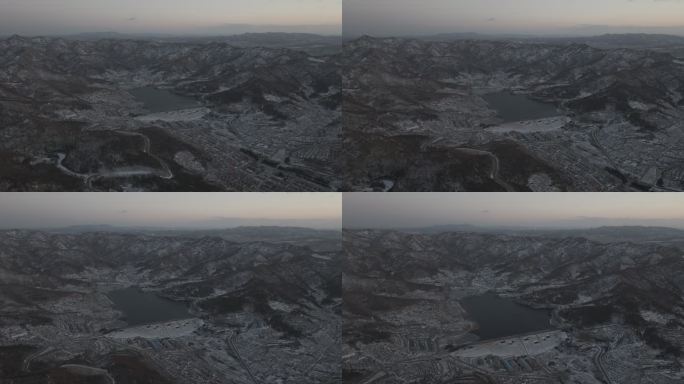 航拍俯瞰冬季威海里口山姜家疃水库群山