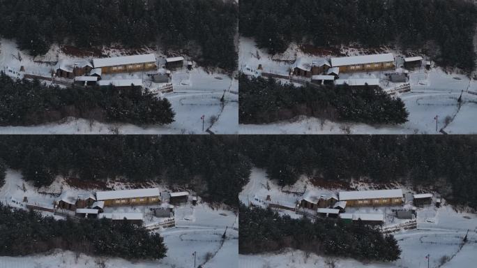吉林松岭雪村旅游雪景山村房屋航拍空镜