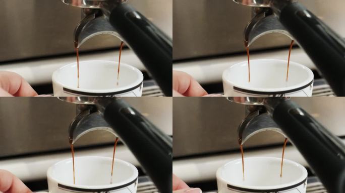 新鲜热气腾腾的咖啡从容器流进杯子