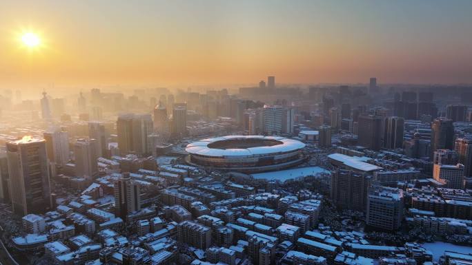 长沙贺龙体育馆日出雪景航拍