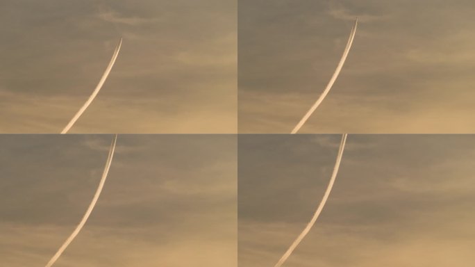 喷气式飞机穿过天空留下漂亮的尾线