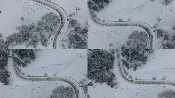 航拍汽车行驶在冬天新疆喀纳斯的山路上