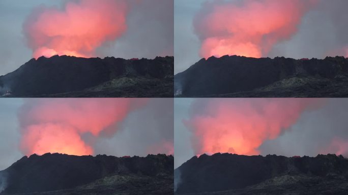 冰岛。火山喷发。炽热的熔岩正在蔓延。火山熔岩河的景观，从地球的地幔中喷出天然的热液体。全球变暖和气候