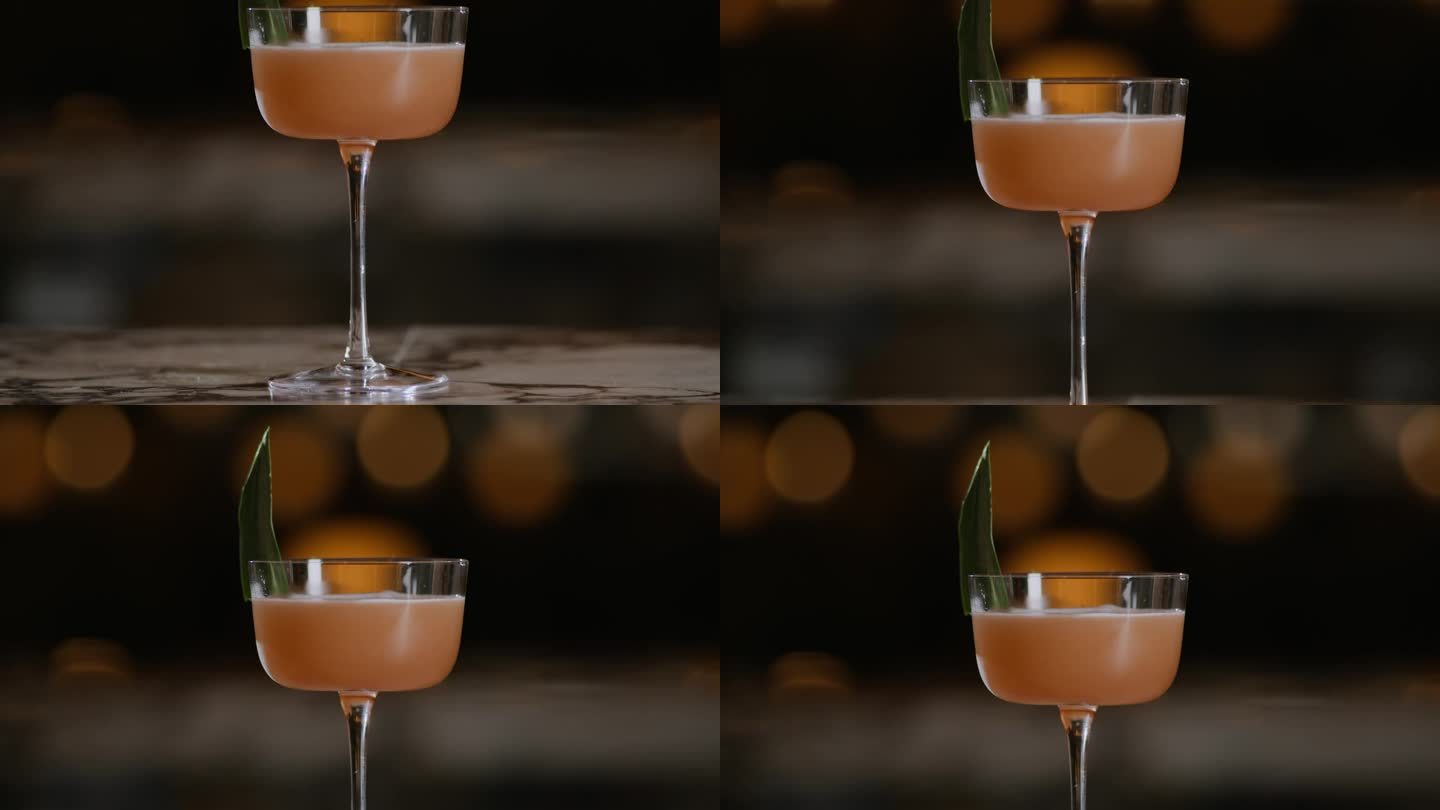 在鸡尾酒吧喝一杯别致的橙色鸡尾酒
