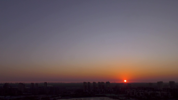 城市天际线日出东方黎明破晓清晨太阳升起