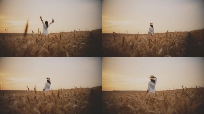 在美丽的夕阳下，戴着帽子的快乐女人在麦田里享受嬉戏的时刻