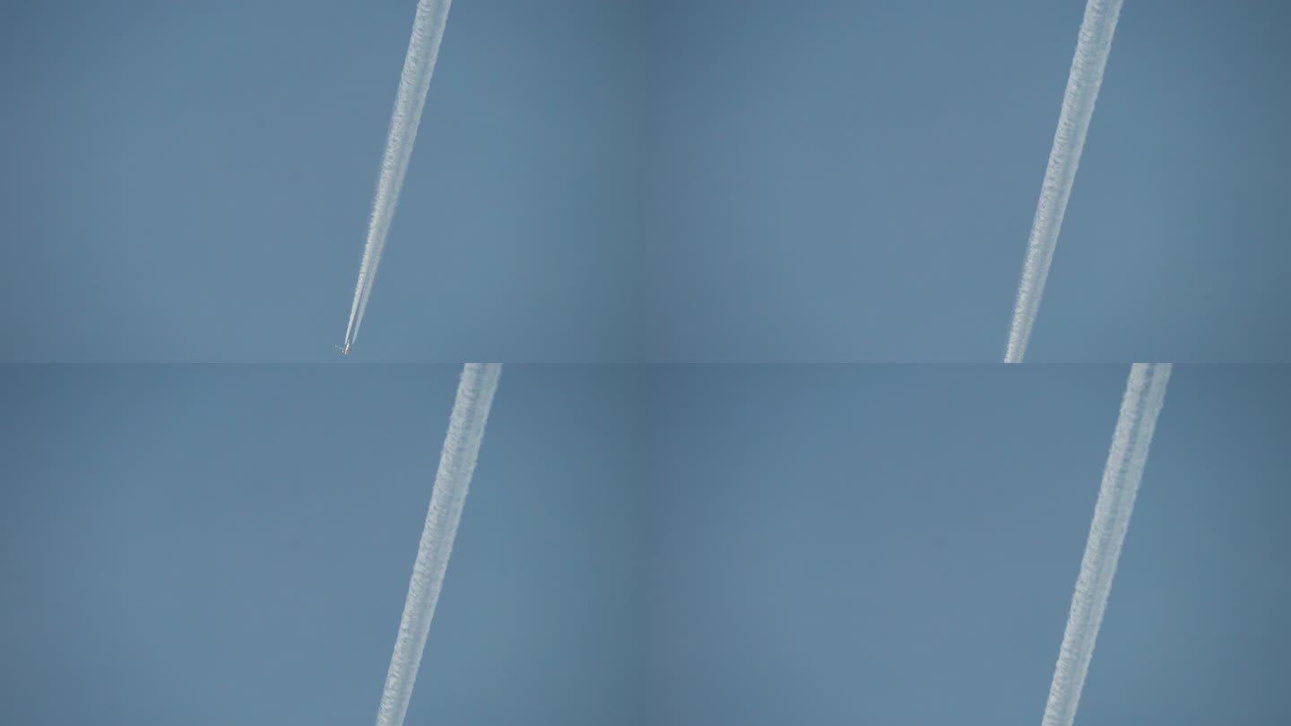喷气式飞机穿过天空留下漂亮的尾线