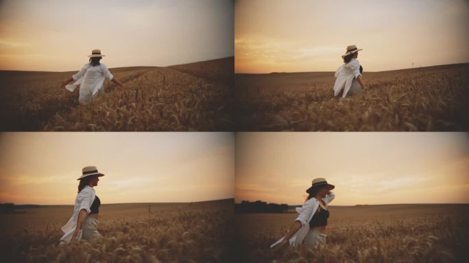 黄昏，一个女人在金色的麦田里快乐地奔跑，拥抱着宁静