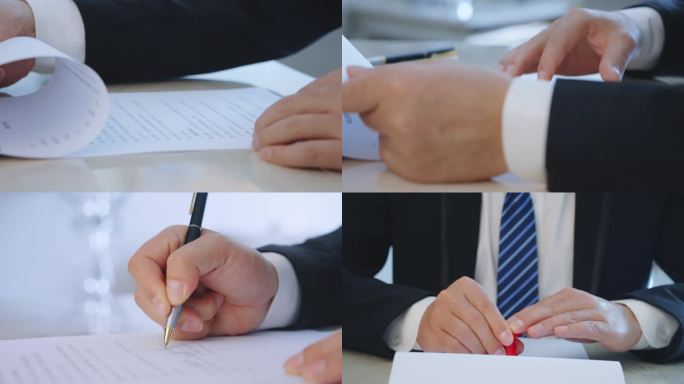 商务人士审核合同签字盖章