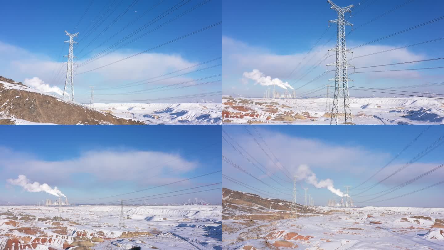 航拍山区雪地工厂高压线塔