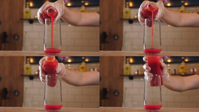 酒保把浓稠的浆果汁倒进杯子里，做成浆果柠檬水。