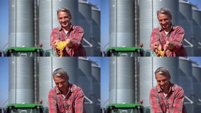 快乐农民在粮仓前展示刚收获的玉米